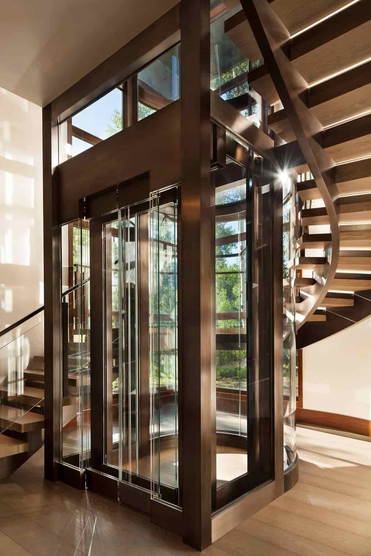 Thiết kế kích thước thang máy kính 350kg yêu cầu hố thang khung thép